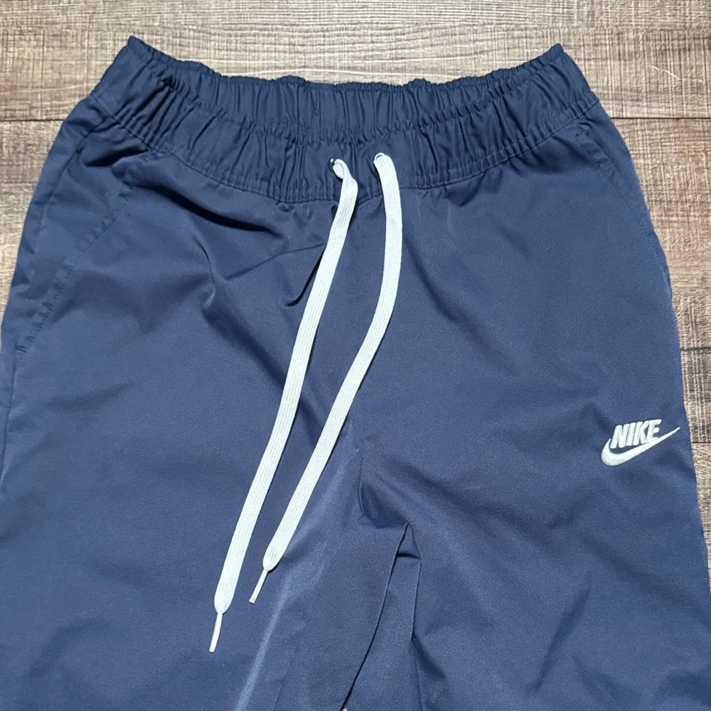 Nike Men's Navy Blue Joggers with White Drawstrings